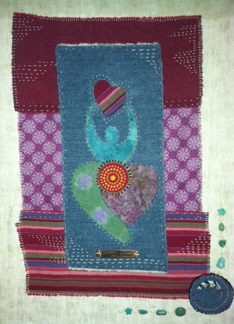 Birthing Goddess--Handstitched on cotton & linen turquoise and copper embellishments. 